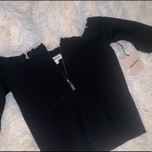 Black long sleeve off the shoulder zip top